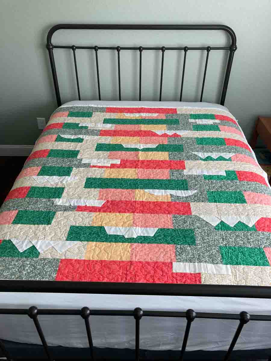 handmade quilt with colorful pocket lapels in red green and yellow