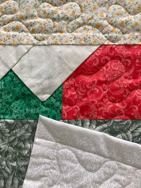 handmade quilt with colorful pocket lapels in red green and yellow